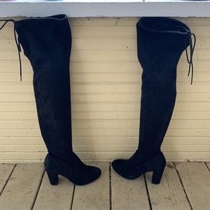 Thigh high boots with adjustable ties for thighs